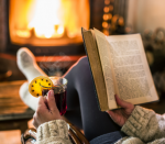 reading book by the fire