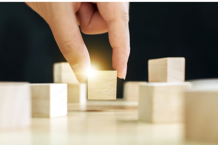 Fingers selecting blocks