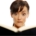 Woman reading book looking surprised